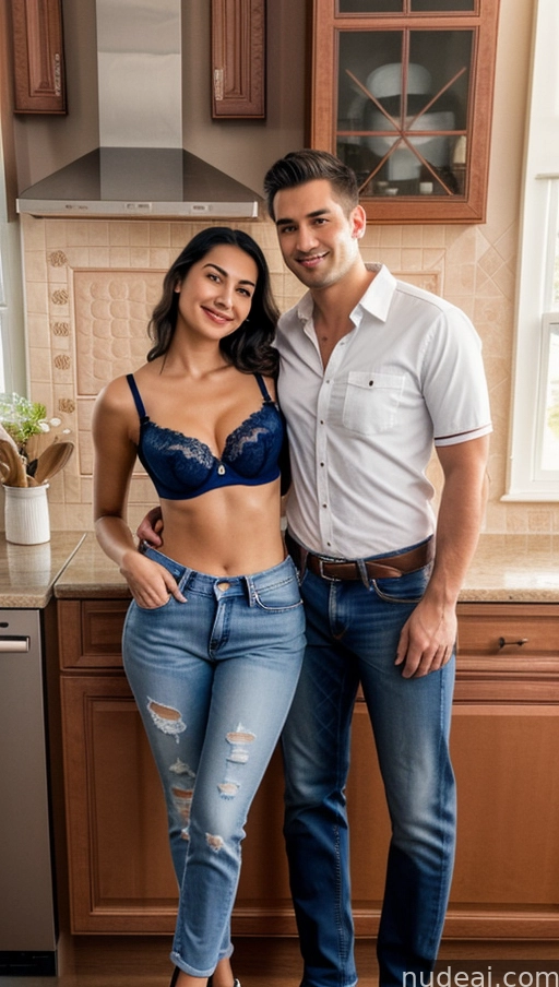 araffes in a kitchen with a man and a woman posing for a picture