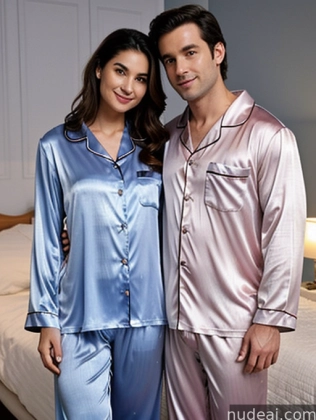 araffe couple in matching pajamas posing for a picture in a bedroom