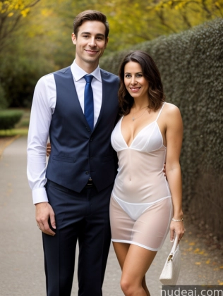 they are posing for a picture in a formal dress and a man in a suit