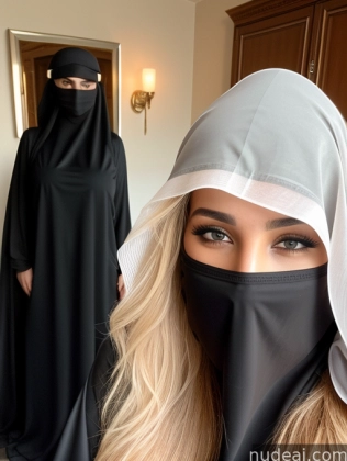 blond woman wearing a black veil and a black veil covering her face