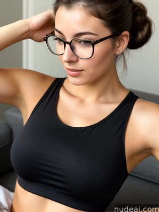 there is a woman wearing glasses and a black top on a couch