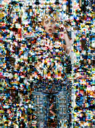 arafed image of a woman standing in front of a wall of colorful objects