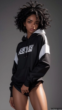 arafed woman in a black and white hoodie posing for a picture