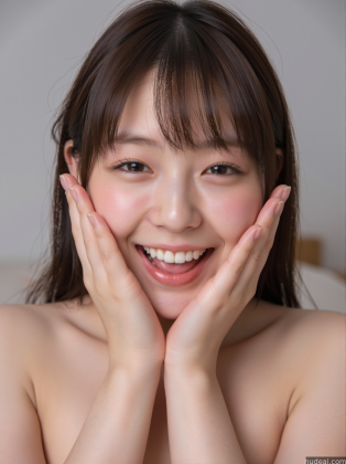 arafed asian woman with a smile on her face and hands on her face